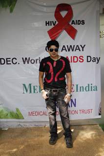 Harish Kumar poses for the media at Medscape India AIDS Awareness Event