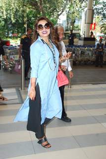 Rani Mukherjee poses for the media at Airport