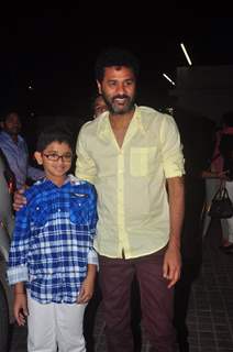 Prabhu Deva poses with his son at the Special Screening of Action Jackson