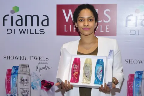 Masaba Gupta poses with the products at the Launch of Fiama Di Wills Shower Jewel