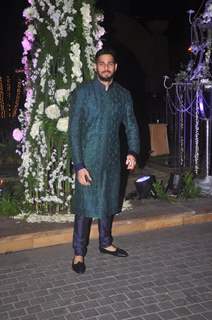 Sidharth Malhotra poses for the media at the Sangeet Ceremony of Riddhi Malhotra and Tejas Talwalkar