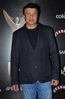 Anu Malik poses for the media at Sansui Stardust Awards Red Carpet