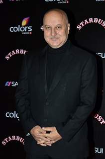 Anupam Kher poses for the media at Sansui Stardust Awards Red Carpet