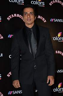 Sonu Sood poses for the media at Sansui Stardust Awards Red Carpet