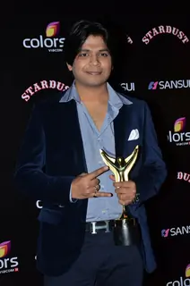 Ankit Tiwari poses for the media at Sansui Stardust Awards Red Carpet