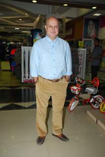 Anupam Kher poses for the media at the Book Launch of 'Once Upon a Star'