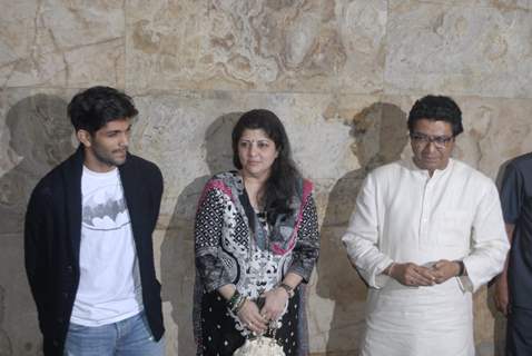Raj Thackeray and Sharmila Thackeray pose for the media at the Special Screening of P.K.