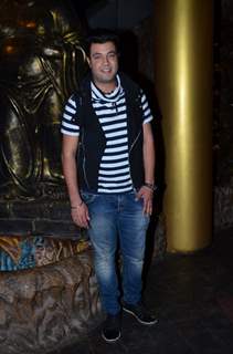 Varun Sharma poses for the media at Richa Chadda's Birthday Bash