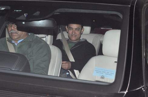 Aamir Khan smiles for the camera at the Special Screening of P.K. at Ambani's Residence