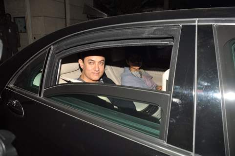 Aamir Khan and Kiran Rao were snapped at the Special Screening of P.K. at Ambani's Residence