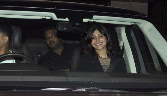 Anushka Sharma smiles for the camera at the Special Screening of P.K. at Ambani's Residence