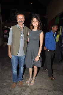 Anushka Sharma poses with Rajkumar Hirani at the Special Screening of P.K. for the Cast and Crew