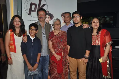 Rajkumar Hirani poses with guests at the Special Screening of P.K. for the Cast and Crew