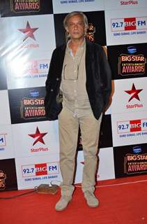 Sudhir Mishra poses for the media at Big Star Entertainment Awards 2014