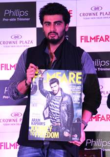 Arjun Kapoor poses with the Latest Issue of Filmfare Magazine at the Launch