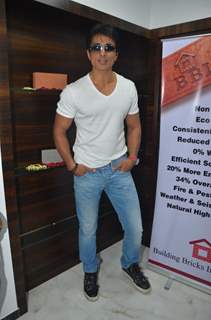 Sonu Sood poses for the media at the Launch of Building Bricks