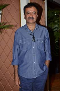 Rajkumar Hirani poses for the media at P.K. Contest Winners Meet