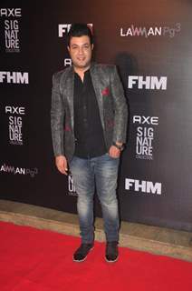 Varun Sharma poses for the media at FHM Bachelor of the Year Bash