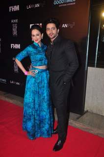 Gunjan Walia and Vikas Manaktala pose for the media at FHM Bachelor of the Year Bash