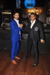 Vidyut Jamwal and Ranveer Singh pose for the media at FHM Bachelor of the Year Bash