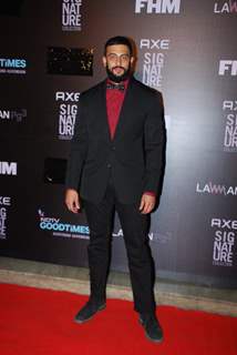 Arunoday Singh poses for the media at FHM Bachelor of the Year Bash