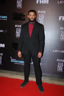 Arunoday Singh poses for the media at FHM Bachelor of the Year Bash