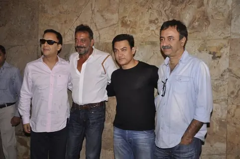 Team poses for the media at the Special Screening of P.K. for Sanjay Dutt