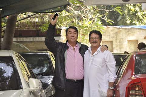 Randhir Kapoor poses with a family member at the Get-to-Gather for a Christmas Lunch