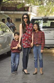 Karisma Kapoor poses with her children at the Get-to-Gather for a Christmas Lunch