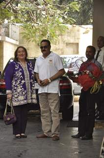 Manoj Jain and Reema Kapoor pose for the media at the Get-to-Gather for a Christmas Lunch