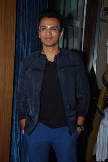 Abhijeet Sawant poses for the media at Lucky's Music Club