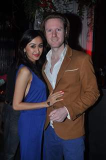 Alex O Neil poses with a friend at Nido's New Year Bash