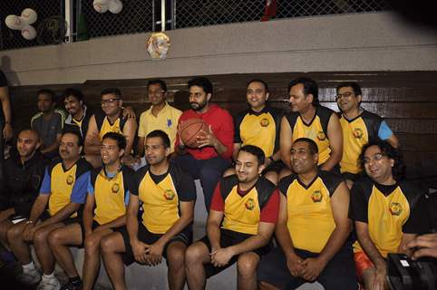 Abhishek Bachchan poses with members of Jamnabai Narsee School