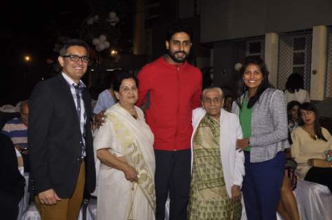 Abhishek Bachchan  poses with guests at Jamnabai Narsee School