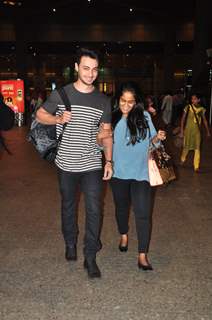 Arpita Khan and Aayush Sharma pose for the media at Airport