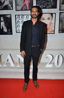 Arjun Rampal poses for the media at Dabboo Ratnani's Calendar Launch