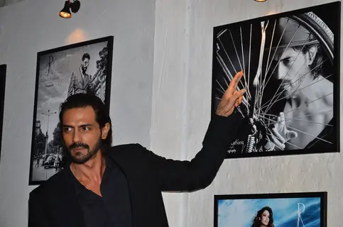 Arjun Rampal poses for the media at Dabboo Ratnani's Calendar Launch