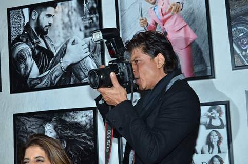 Shah Rukh Khan was snapped clicking photos at Dabboo Ratnani's Calendar Launch