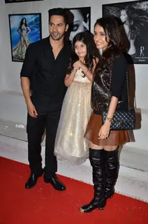 Varun Dhawan and Shraddha Kapoor pose with Dabboo Ratnani's daughter at the Calendar Launch