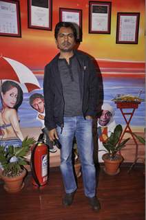 Nawazuddin Siddiqui poses for the media at the Promotions of Badlapur on 93.5 Red FM