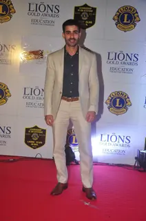 Gautam Rode poses for the media at Lion Gold Awards