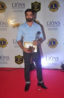 Eijaz Khan poses with his award at Lion Gold Awards