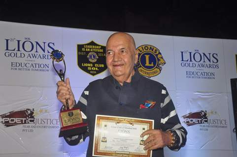 Prem Chopra poses with his award at Lion Gold Awards