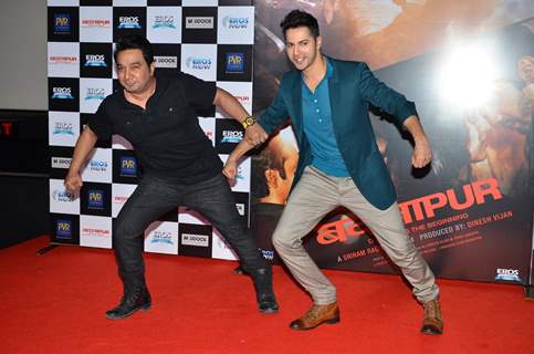 Varun Dhawan and Ahmed Khan strike a pose at the Music Launch of Badlapur