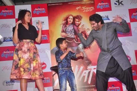 Arjun Kapoor and Sonakshi Sinha shake a leg with a young fan at the Promotions of Tevar