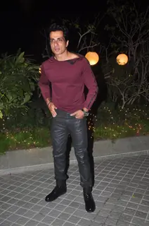 Sonu Sood poses for the media at Farah Khan's Birthday Bash