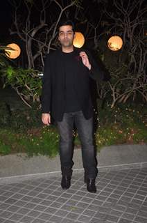 Karan Johar poses for the media at Farah Khan's Birthday Bash