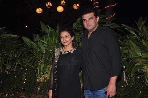 Siddharth Roy Kapoor and Vidya Balan pose for the media at Farah Khan's Birthday Bash