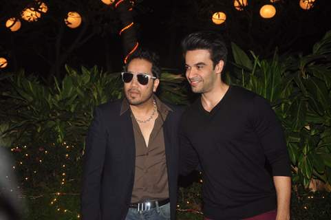 Mika Singh and Punit Malhotra pose for the media at Farah Khan's Birthday Bash