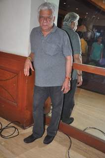 Om Puri poses for the media at the Launch of film Project Marathwada